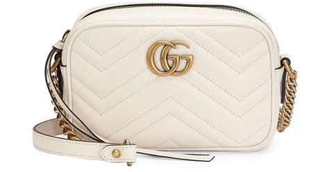 cream gucci purse